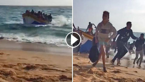 بالفيديو والصور.. مهاجرون مغاربة يقتحمون شاطئا إسبانيا شهيرا وسط دهشة السياح