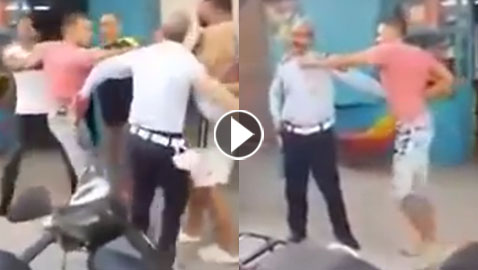 بالفيديو.. شاب تونسي يضرب شرطياً ويقتلع الشارة الحاملة لرتبته بالشارع!