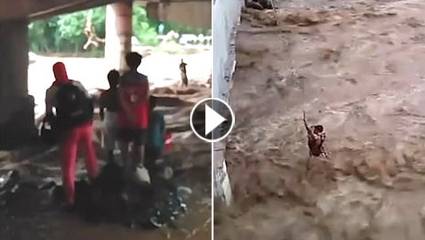 تيار نهر قوي يجرف أم وأولادها أثناء قيامها بغسل الملابس! فيديو
