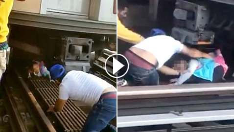 إنقاذ طفلة من تحت عجلات القطار بعد انتحار والدها وهو يمسك بيدها!