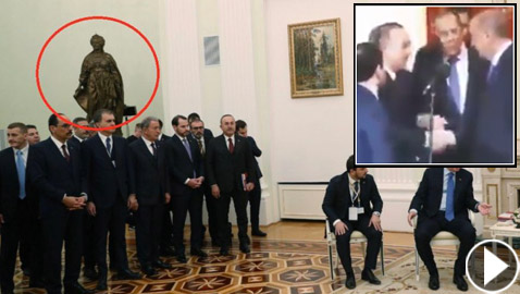 أردوغان يصافح وزير خارجيته وتمثال يثير التساؤل!